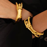 Model wearing Vita open bracelet with minimalist neutral outfit
